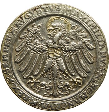 eine Silbermünze mit einem Adler