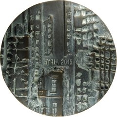Bronzemünze mit der Aufschrift &quot;Syria 2015&quot;